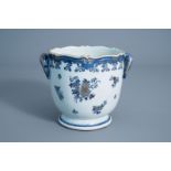 A Chinese blue, white and gilt wine cooler with floral design, Qianlong