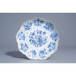 A Chinese blue and white lotus dish with floral design, Kangxi