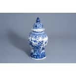 A Dutch Delft blue and white vase and cover with floral design, 18th C.