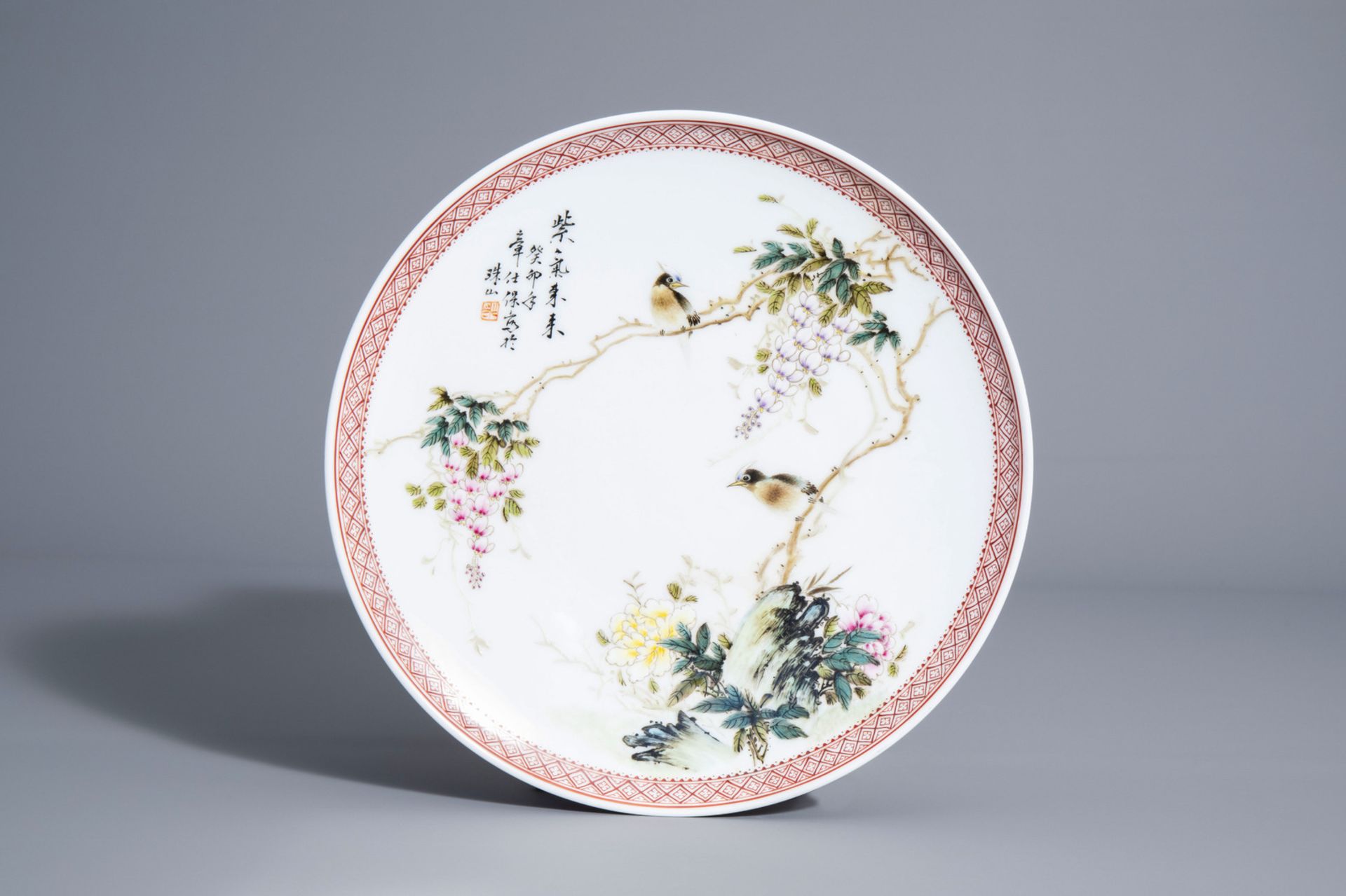 A Chinese famille rose charger with birds on blossoming branches, early People's Republic of China