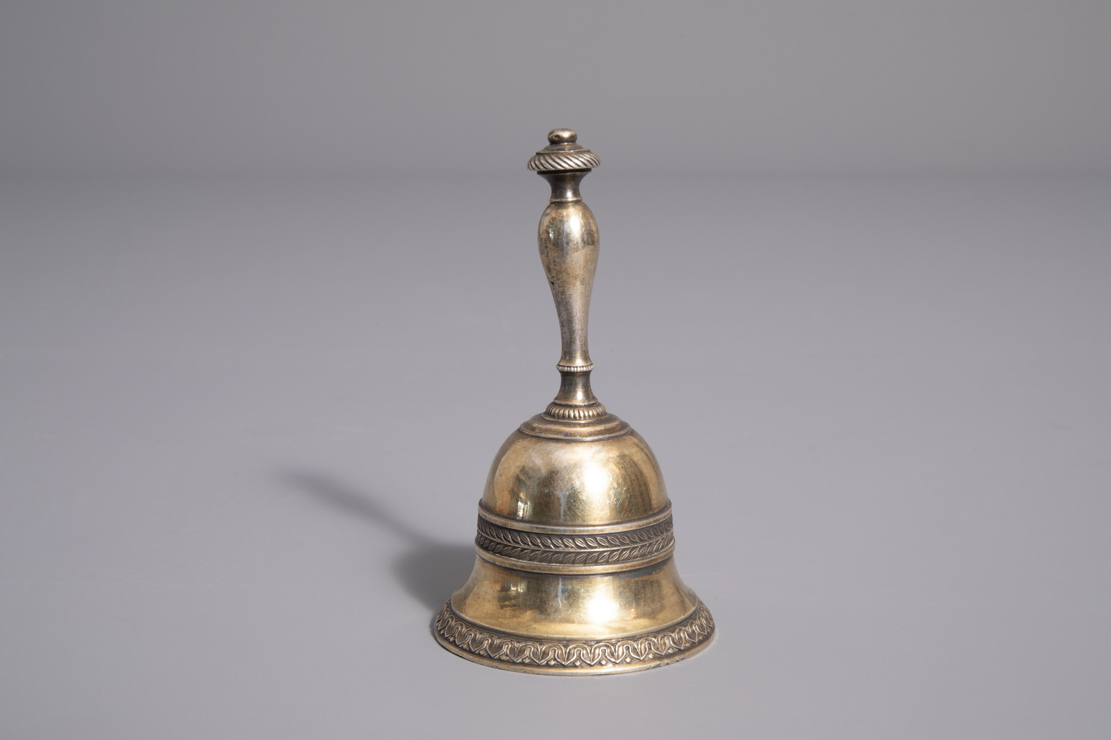 A gilt silver tabel bell, various marks, 19th/20th C. - Image 5 of 9