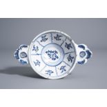 A blue and white faience porringer with floral ornamental design, Northern France, about 1800