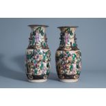 A pair of Chinese Nanking crackle glazed famille rose vases with warrior scenes, 19th C.