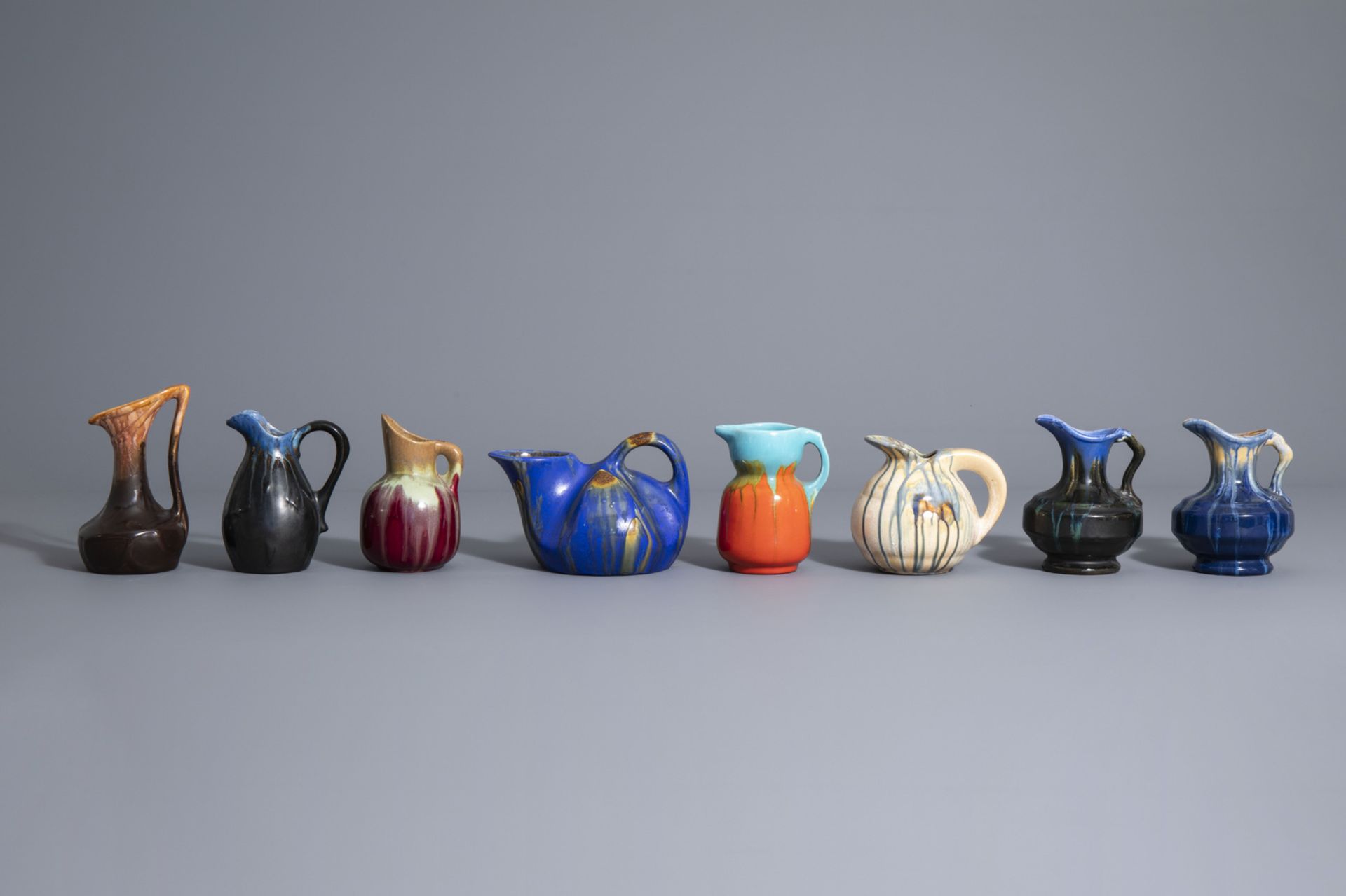 23 polychrome Art Nouveau and Art Deco jugs, a.o. Thulin, 20th C. - Image 16 of 19