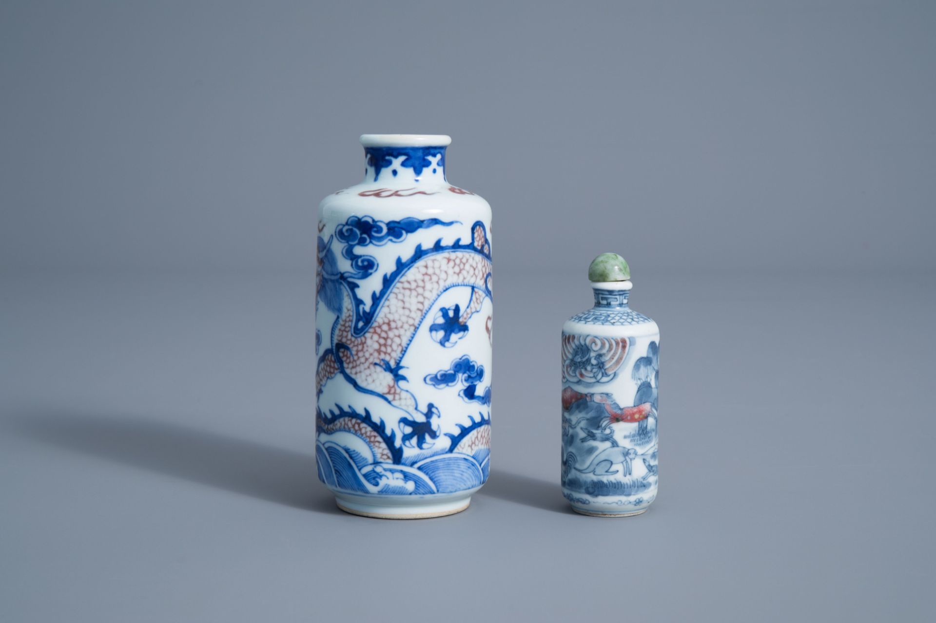 Two Chinese blue, white and copper red 'dragon' snuff bottles, 19th C. - Image 4 of 6