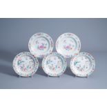 Five Chinese famille rose plates with figures in a garden and floral design, Qianlong