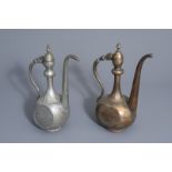 Two Islamic or Persian pewter and brass 'aftaba' ewers, 19th C.