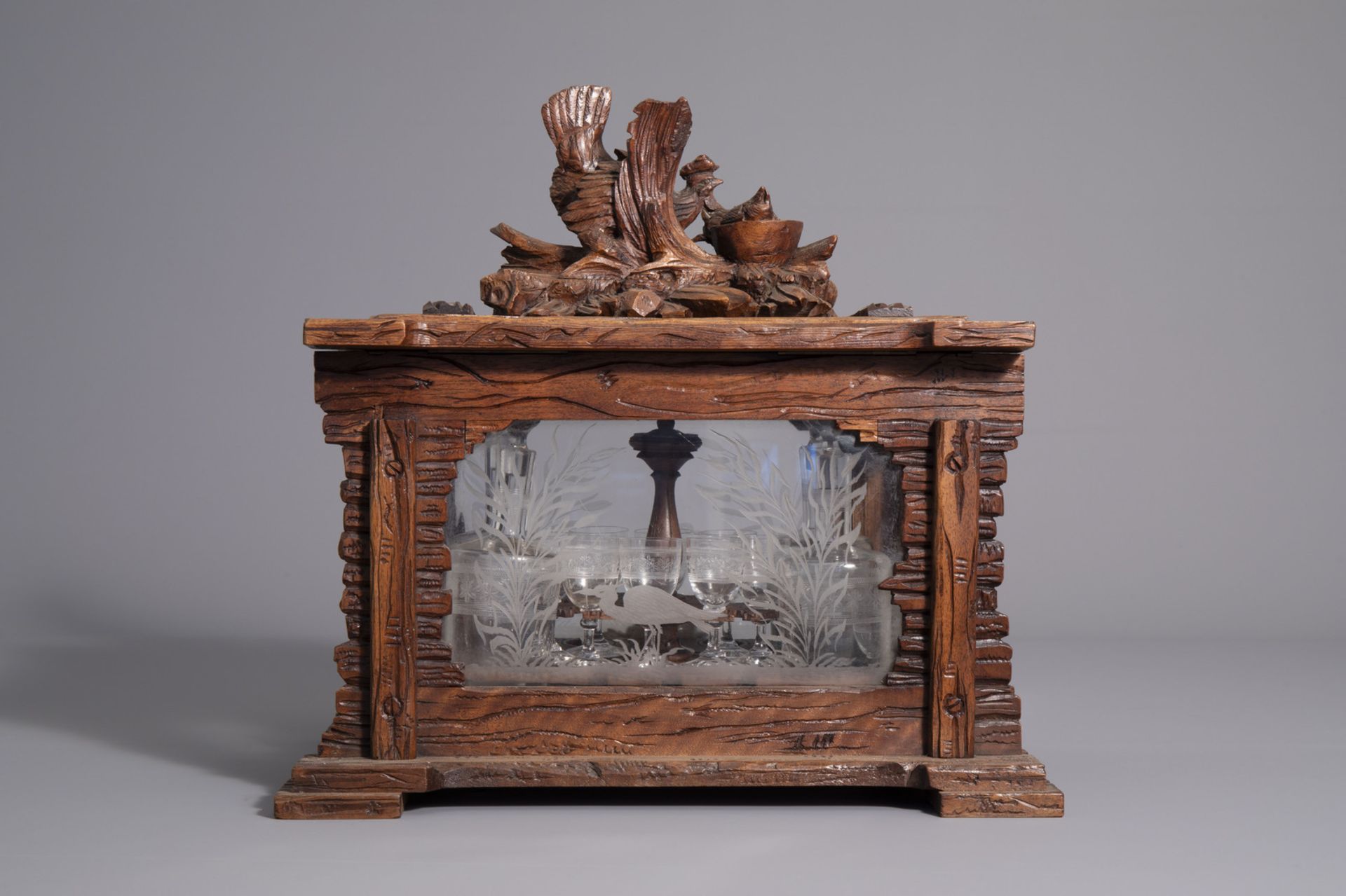 A carved wooden Black Forest 'cave ˆ liqueur' with etched glasses, Germany, 19th C. - Image 6 of 34