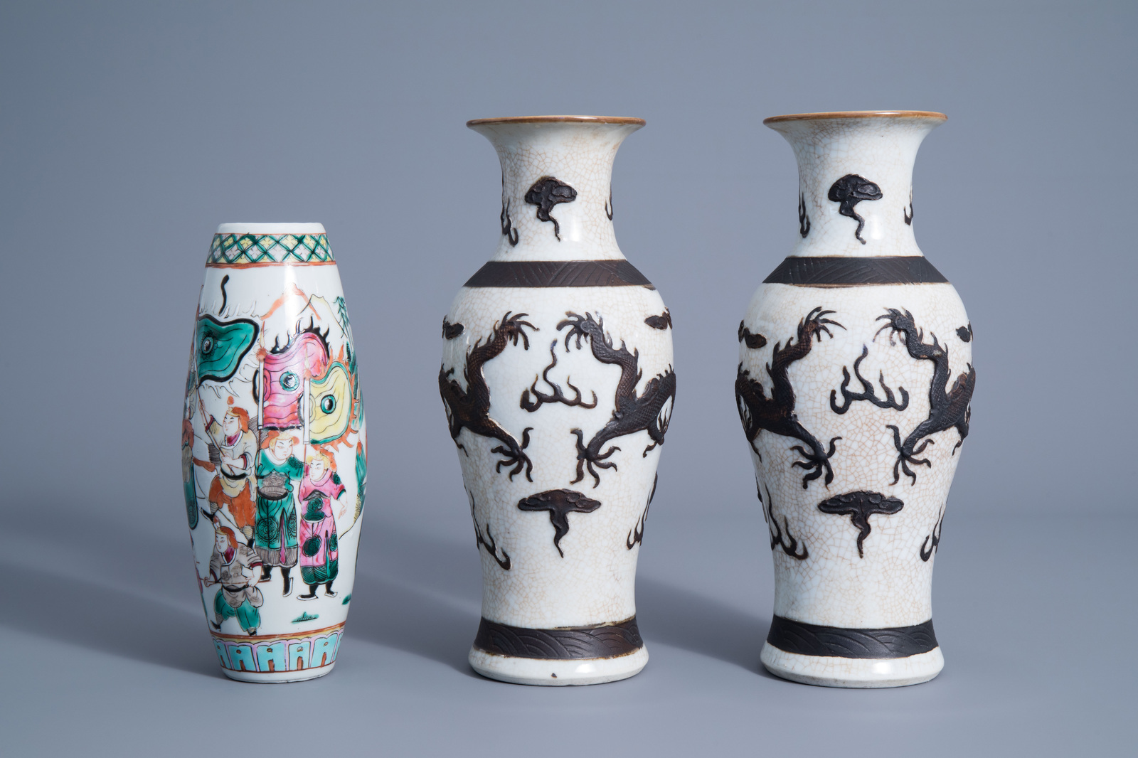 A pair of Chinese Nanking crackle glazed vases with a dragon and a famille rose vase with a warrior - Image 4 of 7
