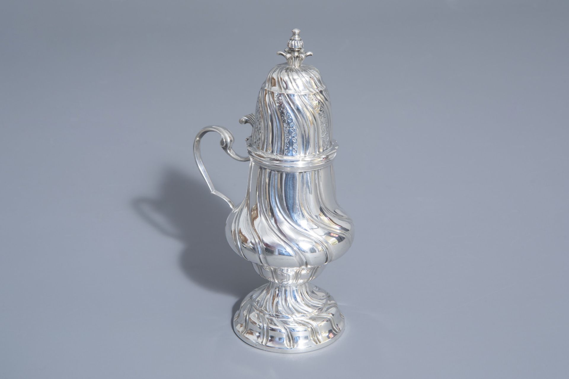 A silver Louis XV style mustard pot, dated [17]77