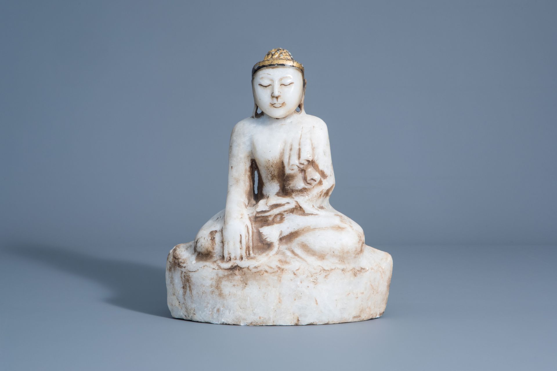 A gilt decorated alabaster figure of Buddha, Burma, 19th C.