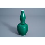 A Chinese monochrome apple-green double gourd vase, 19th C.