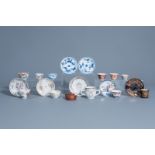 A collection of Chinese and Japanese cups and saucers and a Yixing stoneware teapot and cover, Kangx