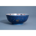 A Chinese Imari style powder blue ground bowl with gilt design, Kangxi