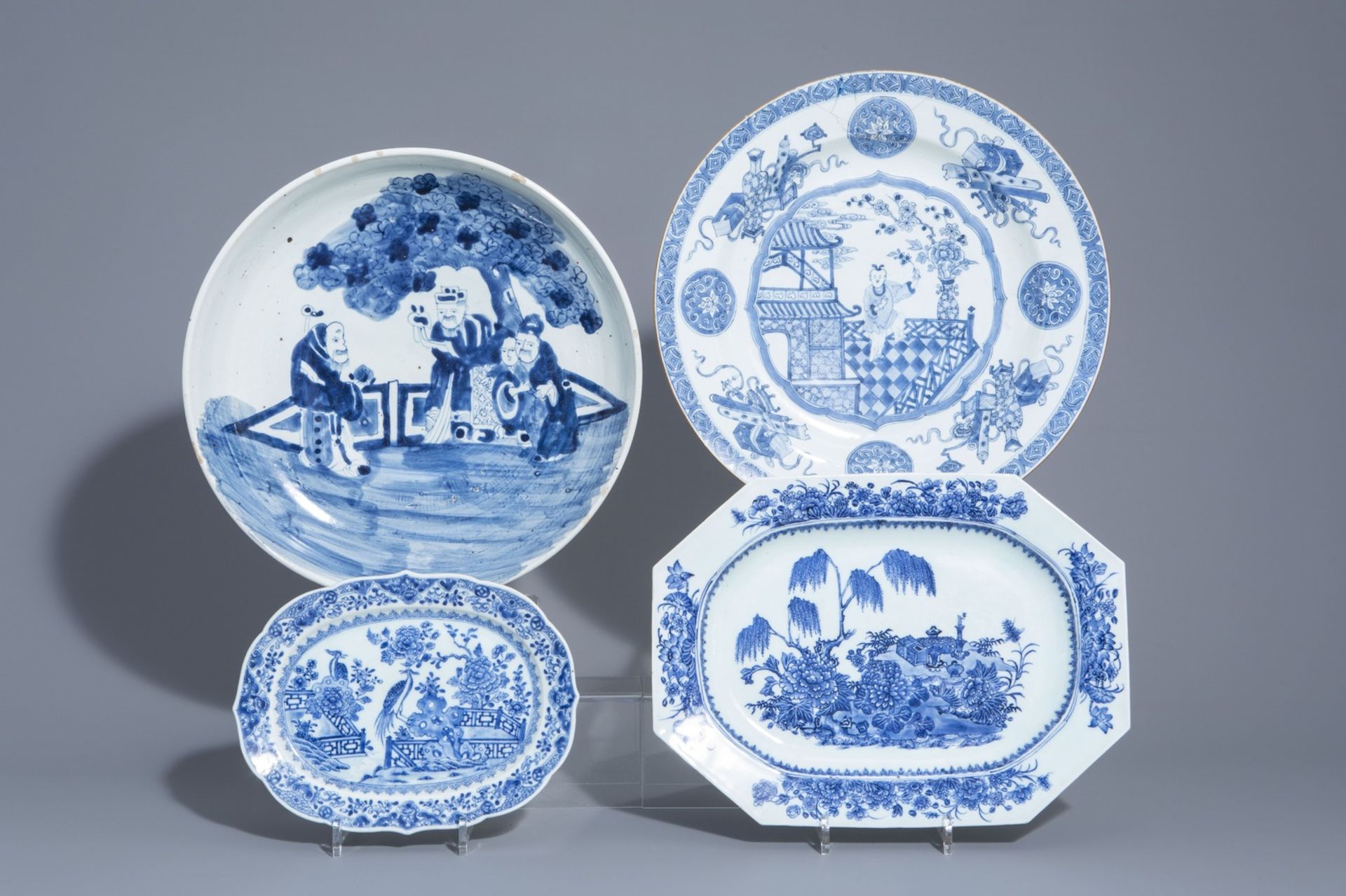 Four Chinese blue and white chargers, Kangxi and later