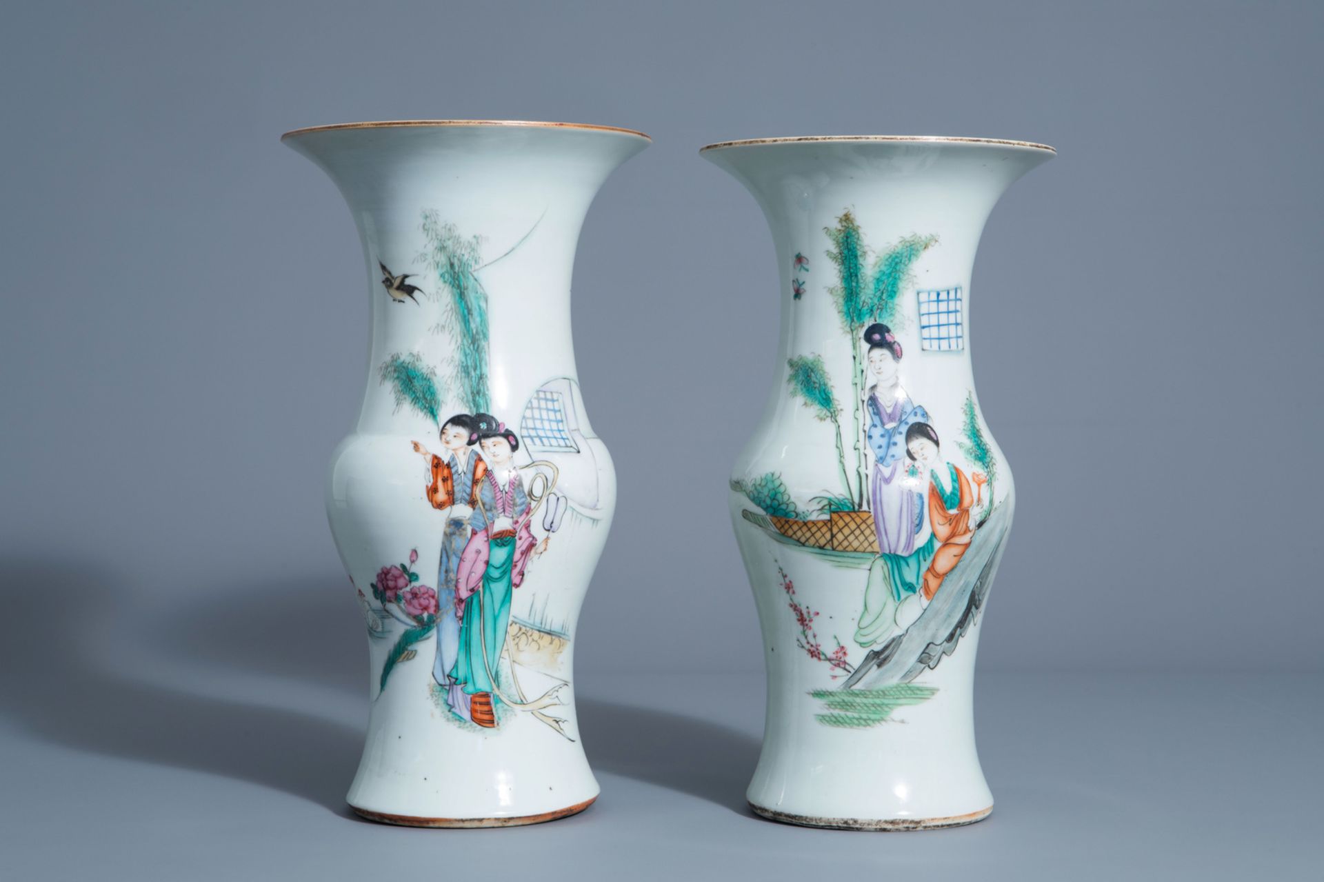 Two Chinese famille rose yenyen vases with ladies in a garden, 19th/20th C.
