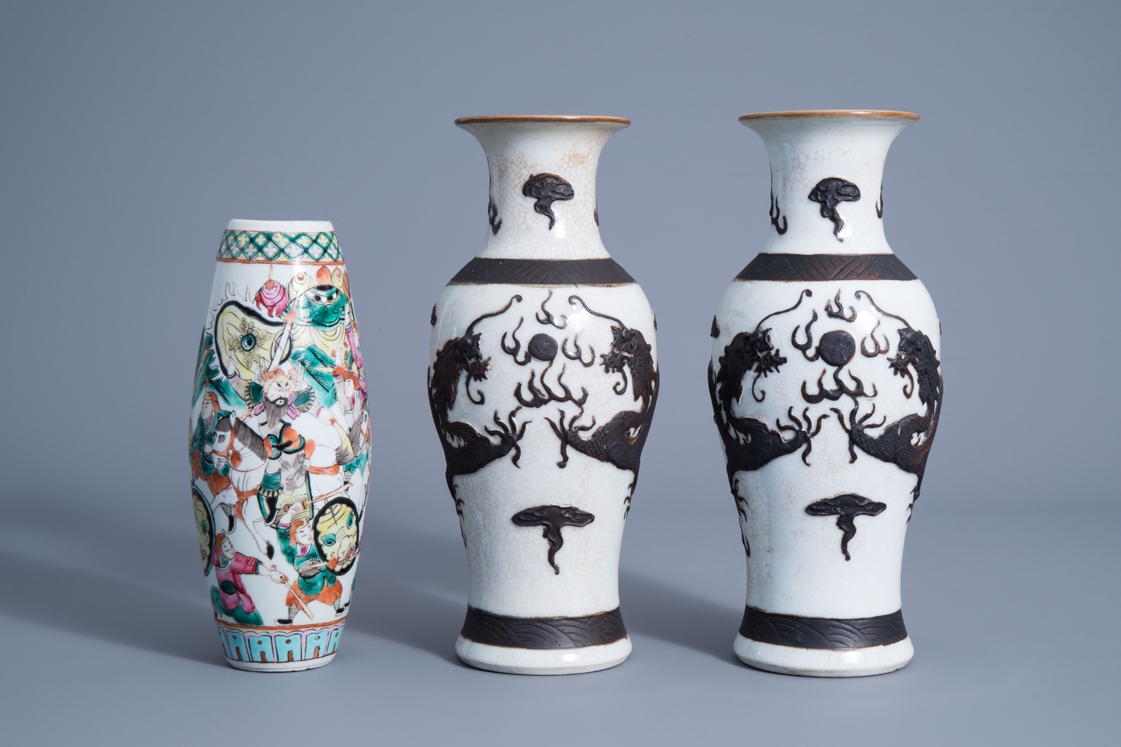 A pair of Chinese Nanking crackle glazed vases with a dragon and a famille rose vase with a warrior - Image 2 of 7