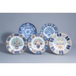 Five Dutch Delft blue, white and polychrome chargers with floral design, 18th/19th C.