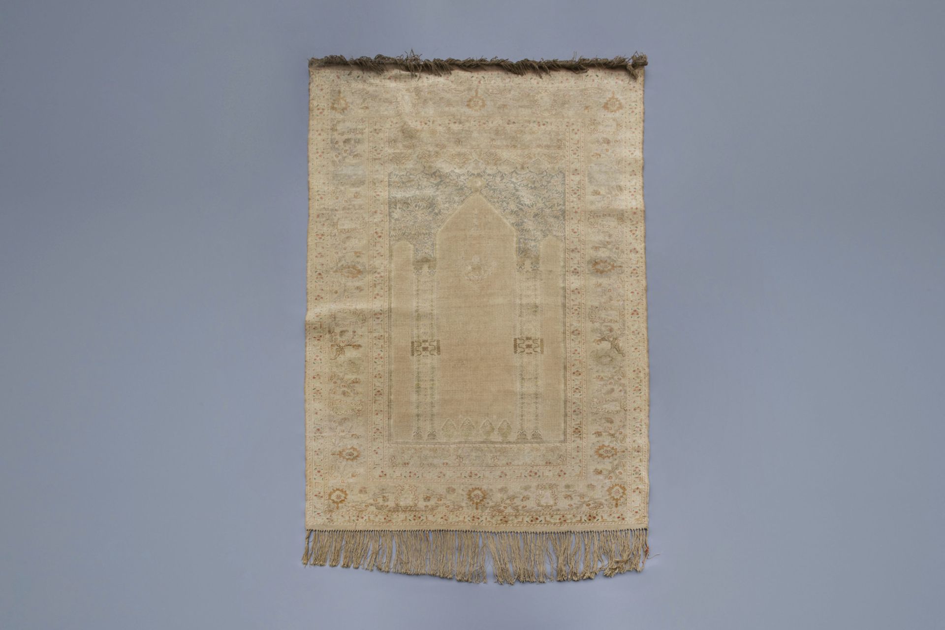 A very fine knotted Turkish prayer rug with different designs, silk on cotton, mid 19th C.