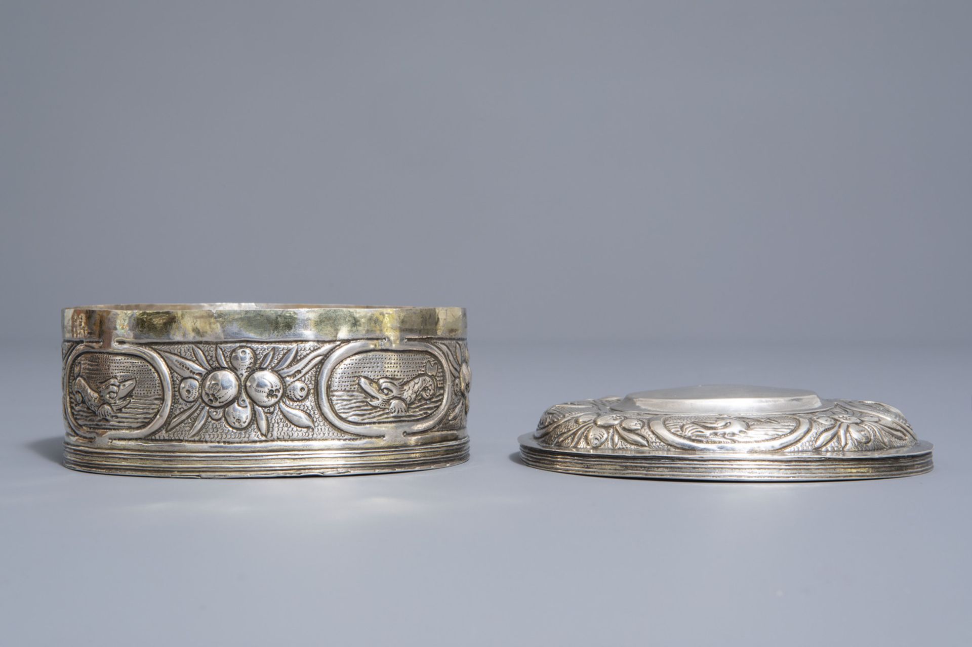 An oval shaped silver plated relief decorated tobacco box, various marks, 18th/19th C. - Image 2 of 8