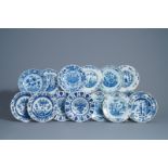 A collection of fourteen Dutch Delft blue and white plates, 18th C.