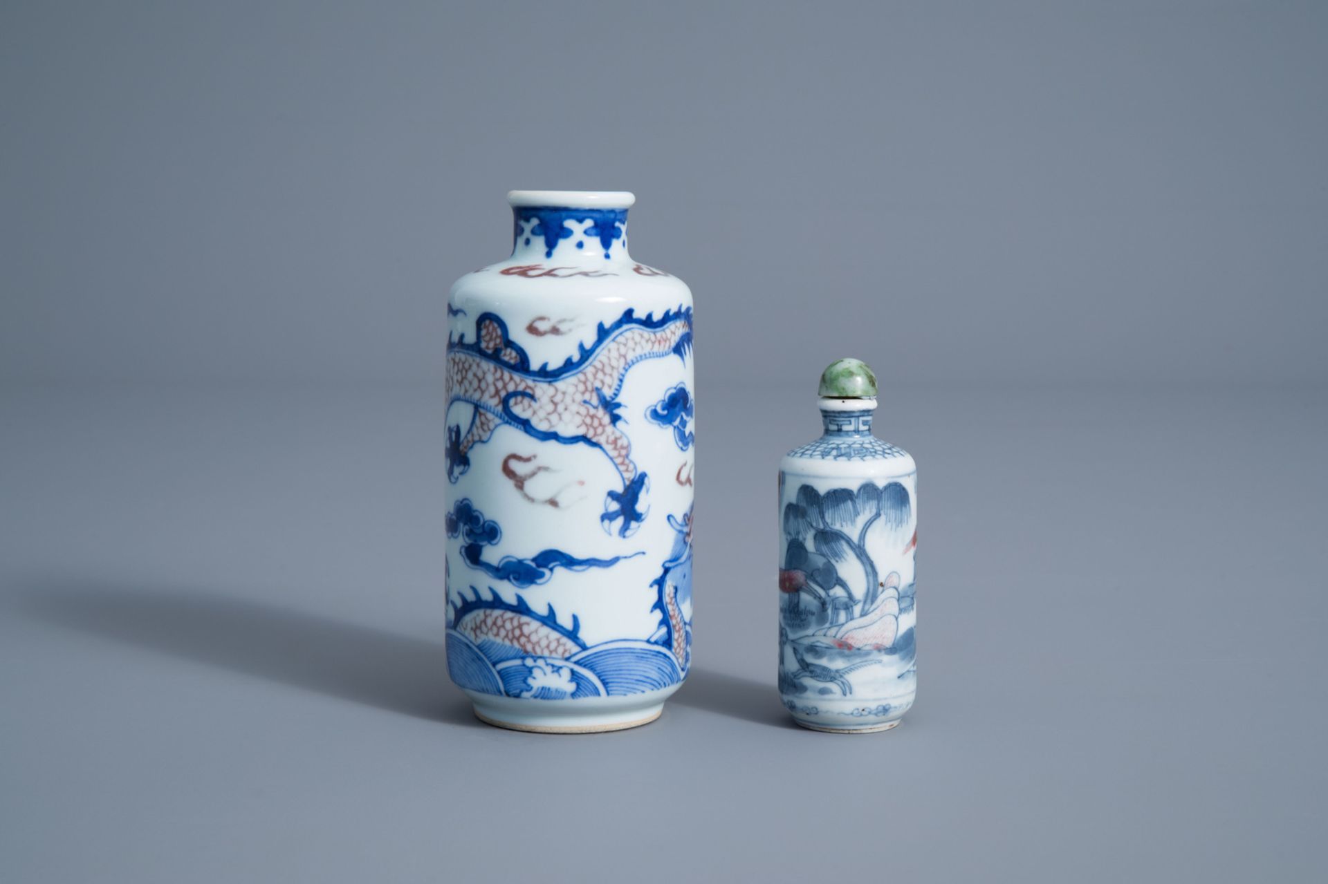 Two Chinese blue, white and copper red 'dragon' snuff bottles, 19th C. - Image 3 of 6