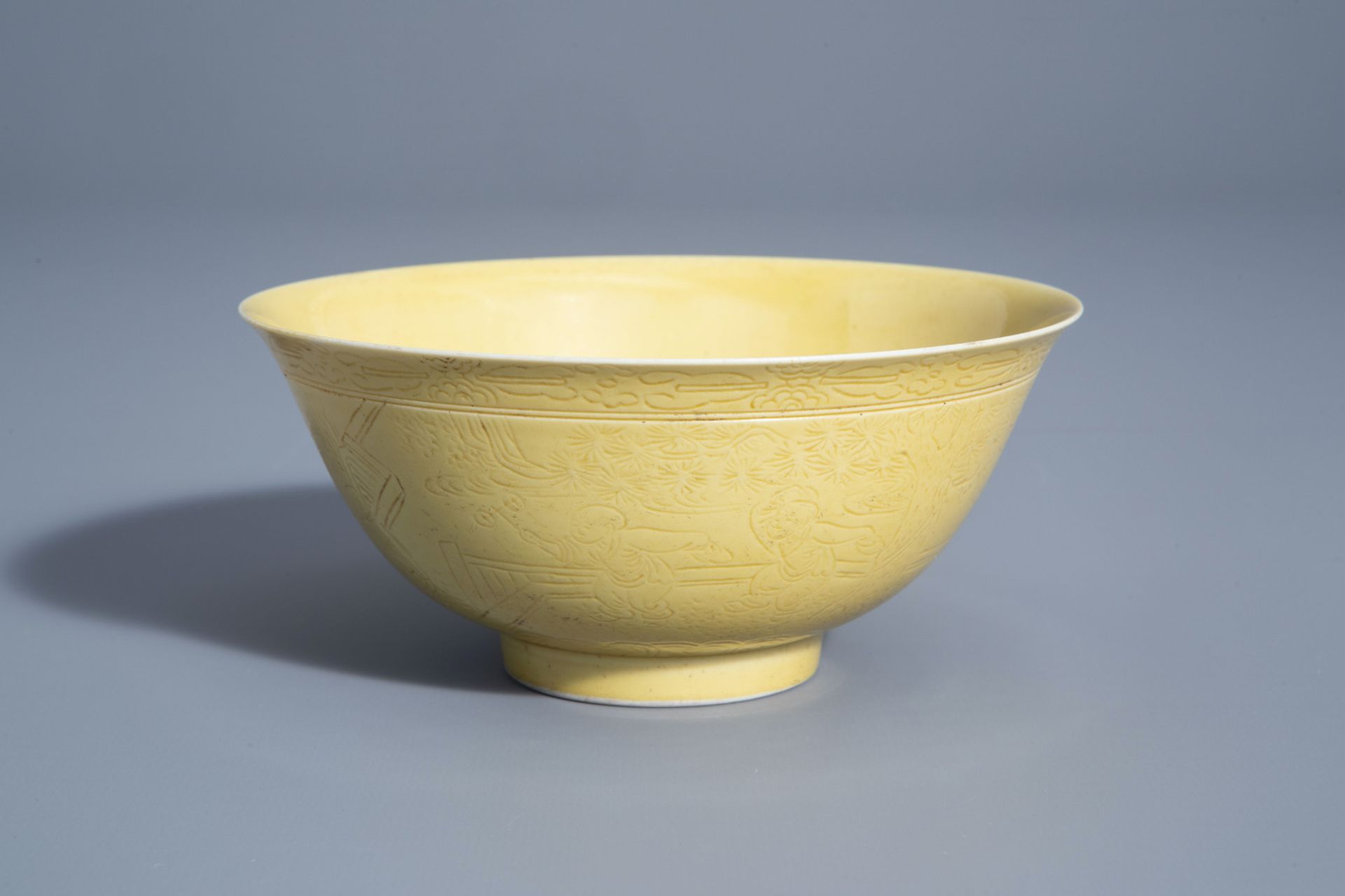 A Chinese yellow ground bowl with incised underglaze design, Yongzheng mark, 19th/20th C.