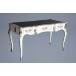 A white lacquered Louis XV style bureau plat writing table with leather top, France, 20th C.