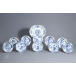 Ten Chinese blue and white plates and a charger with floral design, Qianlong