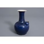 A Chinese monochrome blue kendi, Chenghua mark, Kangxi