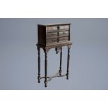 A tortoise veneer and ebony wood cabinet on stand, Antwerp, 17th C. and later