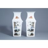 A pair of Chinese quadrangular famille rose vases with figures in a landscape, 20th C.