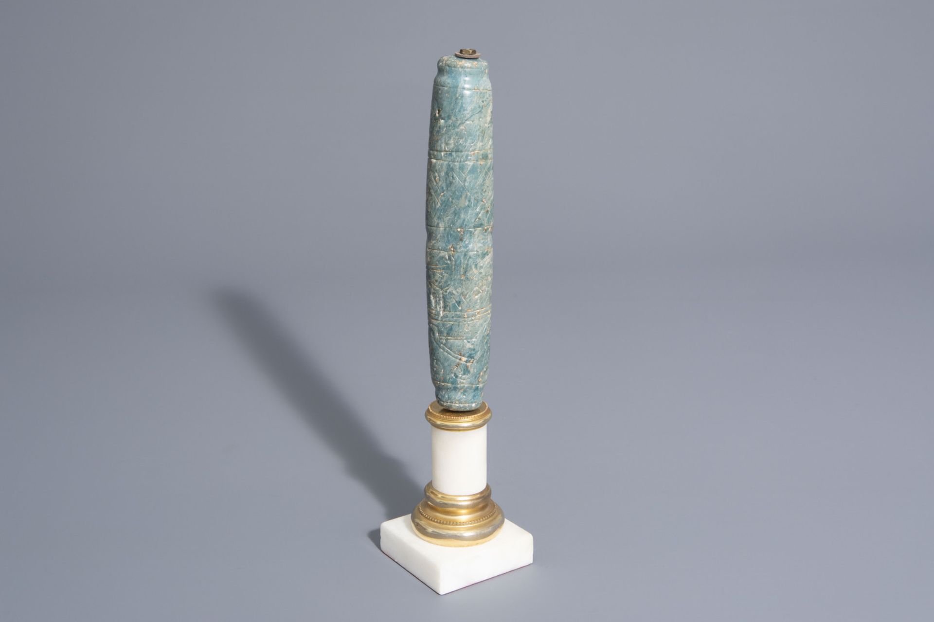 A Mexican dark green jade pipe on base, possibly Maya culture, 15th C. or later