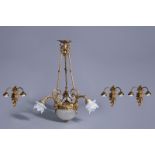 A historicizing gilt copper alloy chandelier with three accompanying wall appliques, 20th C.