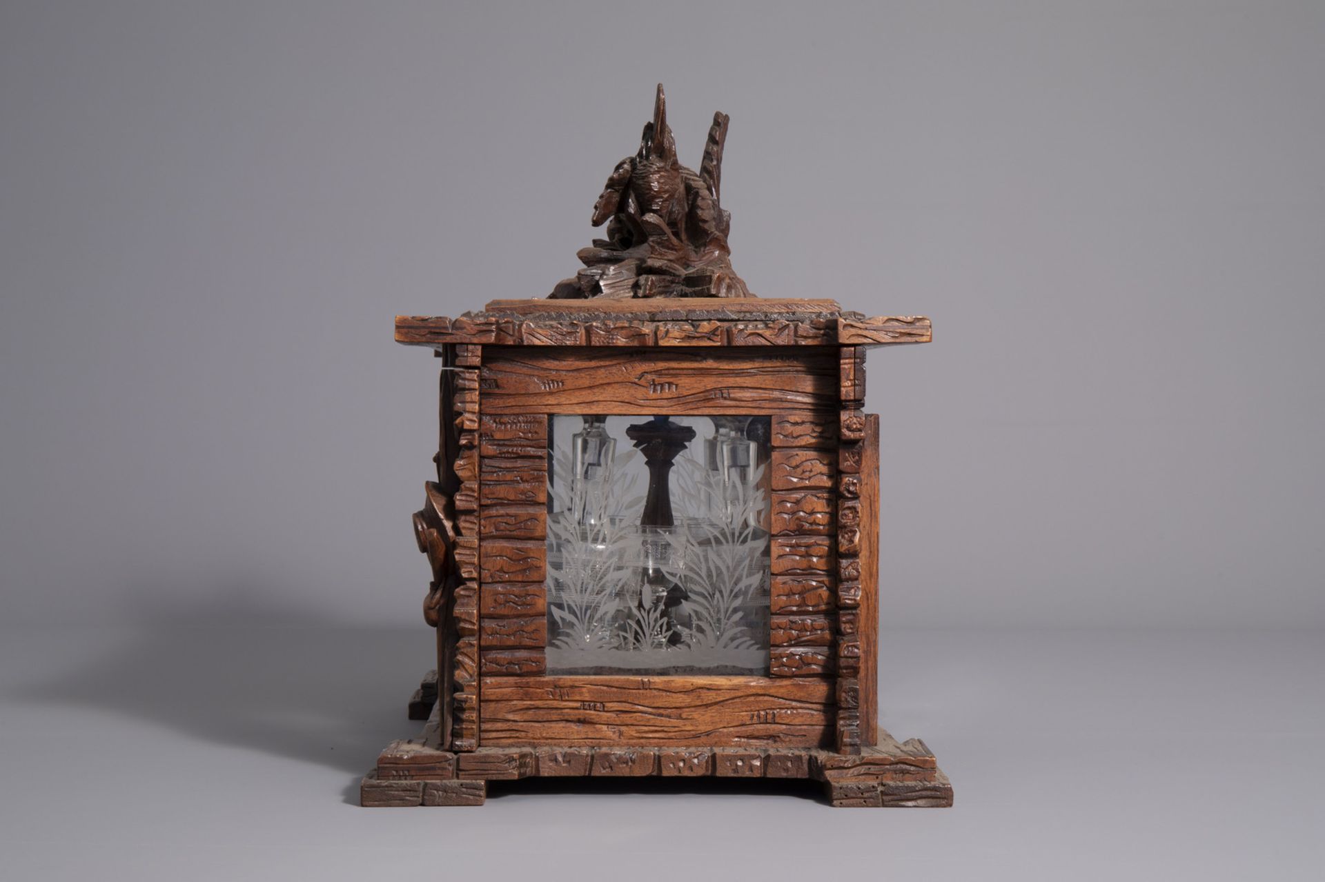 A carved wooden Black Forest 'cave ˆ liqueur' with etched glasses, Germany, 19th C. - Image 7 of 34