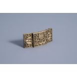 A Chinese brass belt buckle with bats and floral design, Qing or Republic