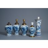 Five Dutch Delft blue and white lamp mounted vases, 18th C.