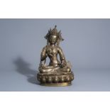 A Sino-Tibetan gilt bronze figure of Buddha, 19th/20th C.