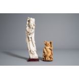 Two Chinese carved figures of an Immortal and a Buddha with children, 19th/20th C.