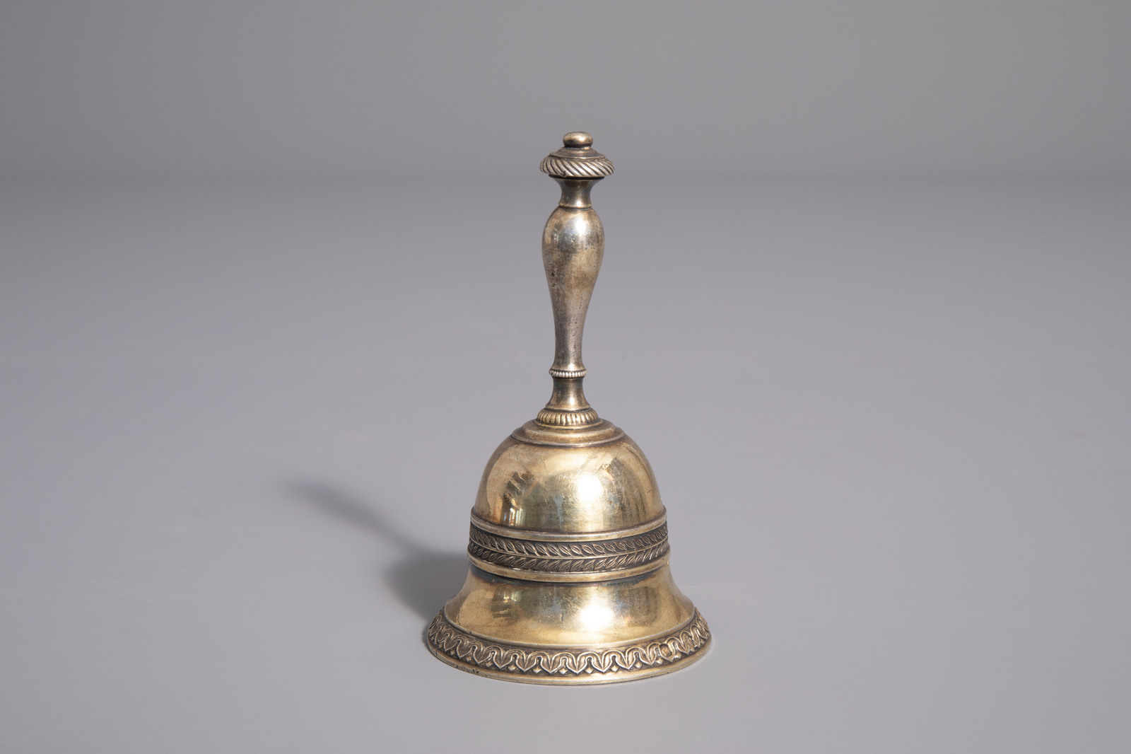 A gilt silver tabel bell, various marks, 19th/20th C. - Image 3 of 9