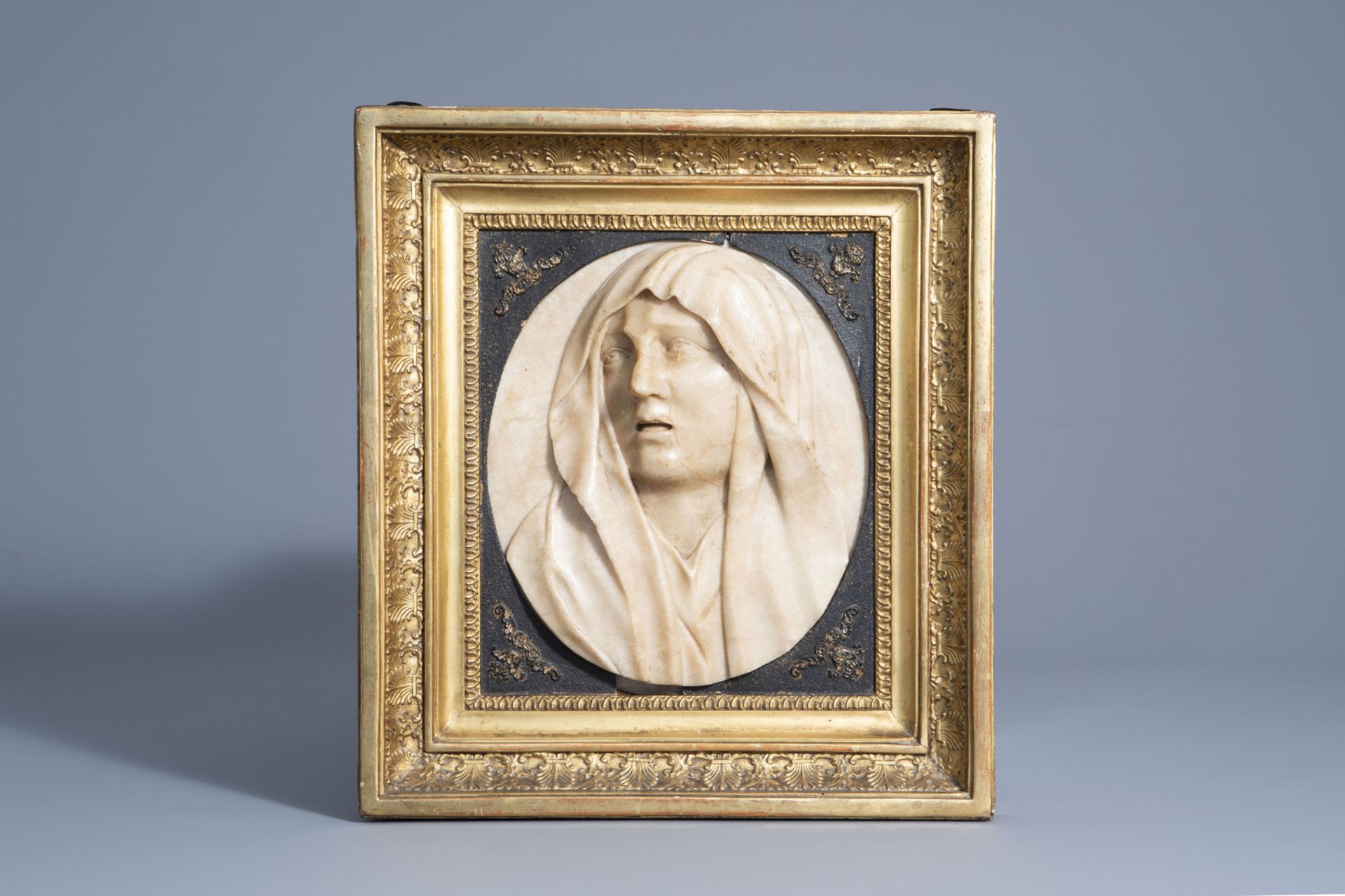 An Italian or Parisian alto relievo white marble portrait plaque depicting a Vestal Virgin, 17th C.