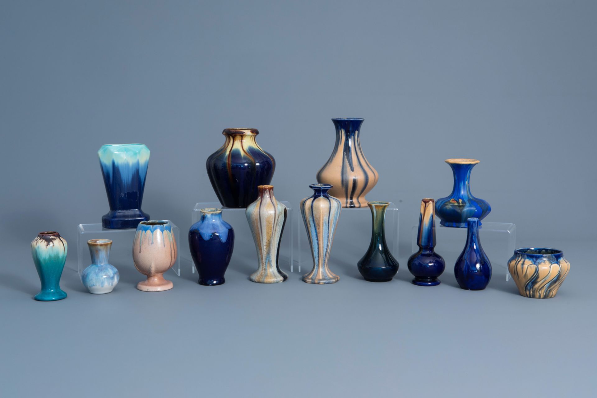 Fourteen polychrome Art Nouveau vases, a.o. Thulin and Astoria, first half of the 20th C.