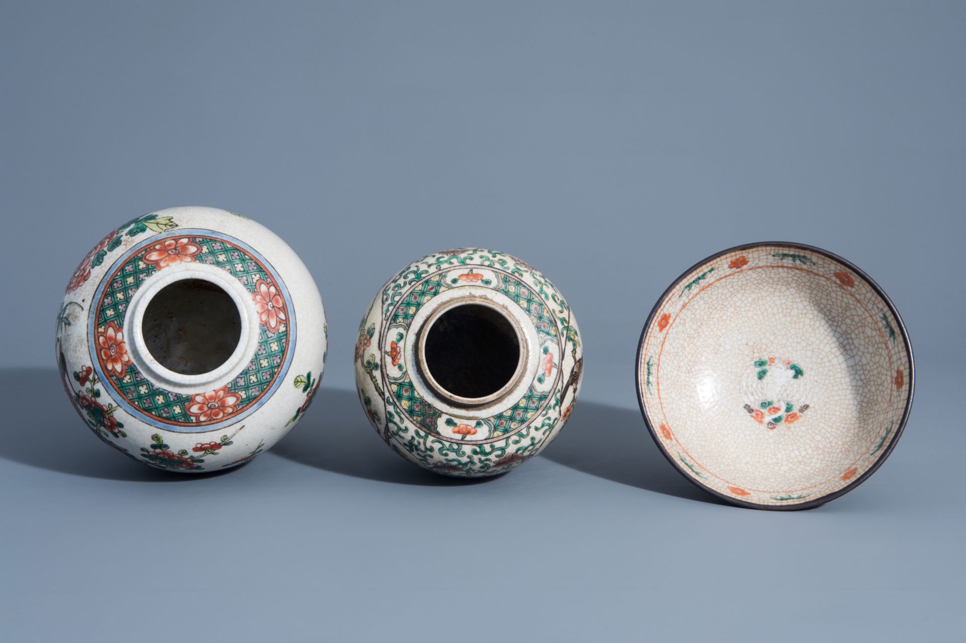 A varied collection of Chinese Nanking crackle glazed famille rose vases, ginger jars, a charger and - Image 12 of 17