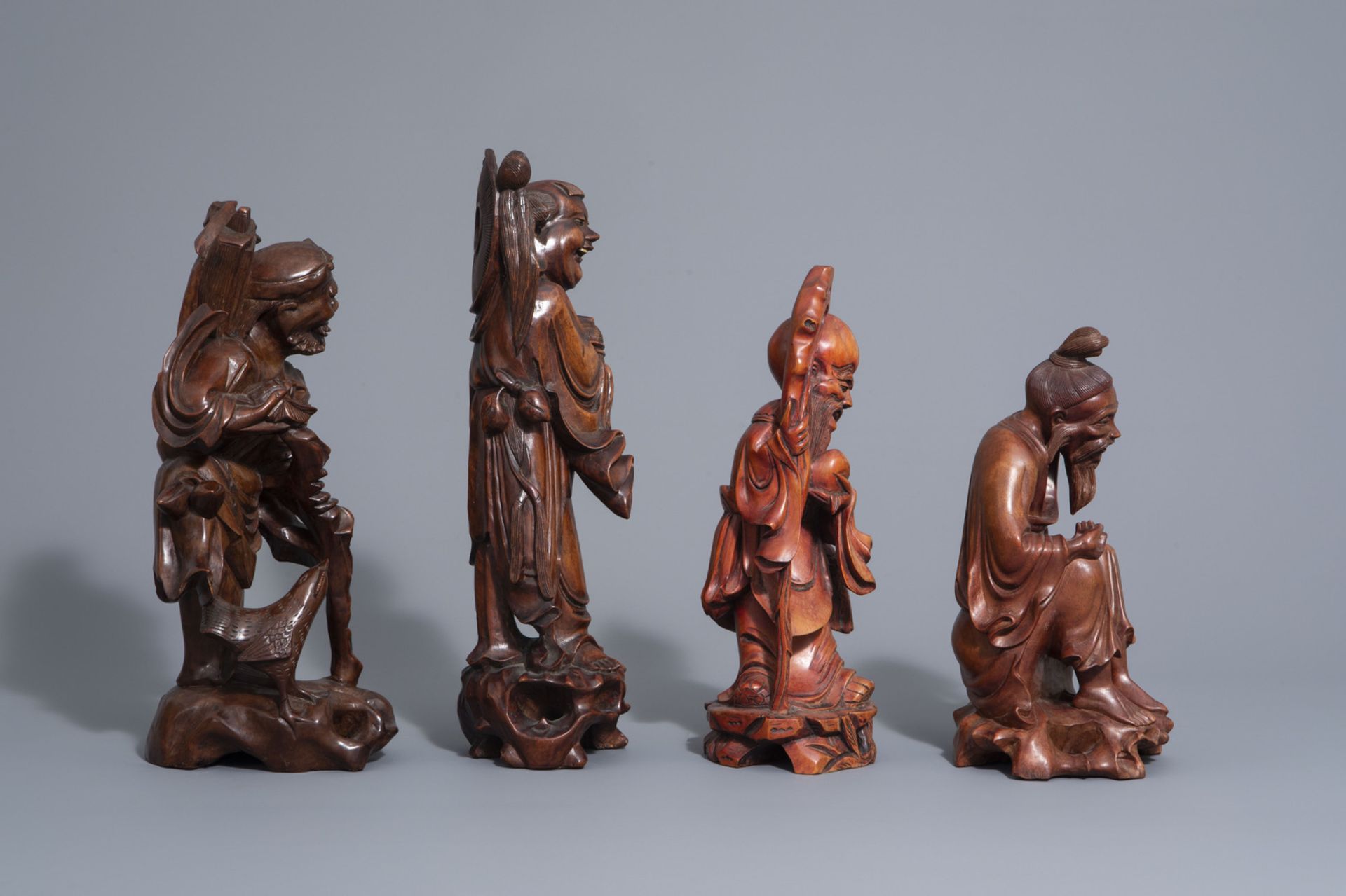 A collection of nine Chinese wooden figures, 19th/20th C. - Bild 3 aus 15