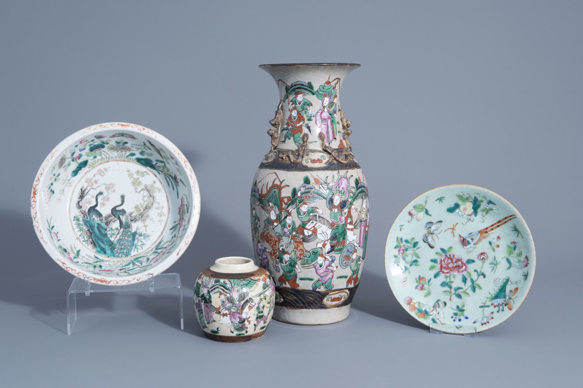 A varied collection of Chinese Nanking crackle glazed and famille rose porcelain, 19th C.