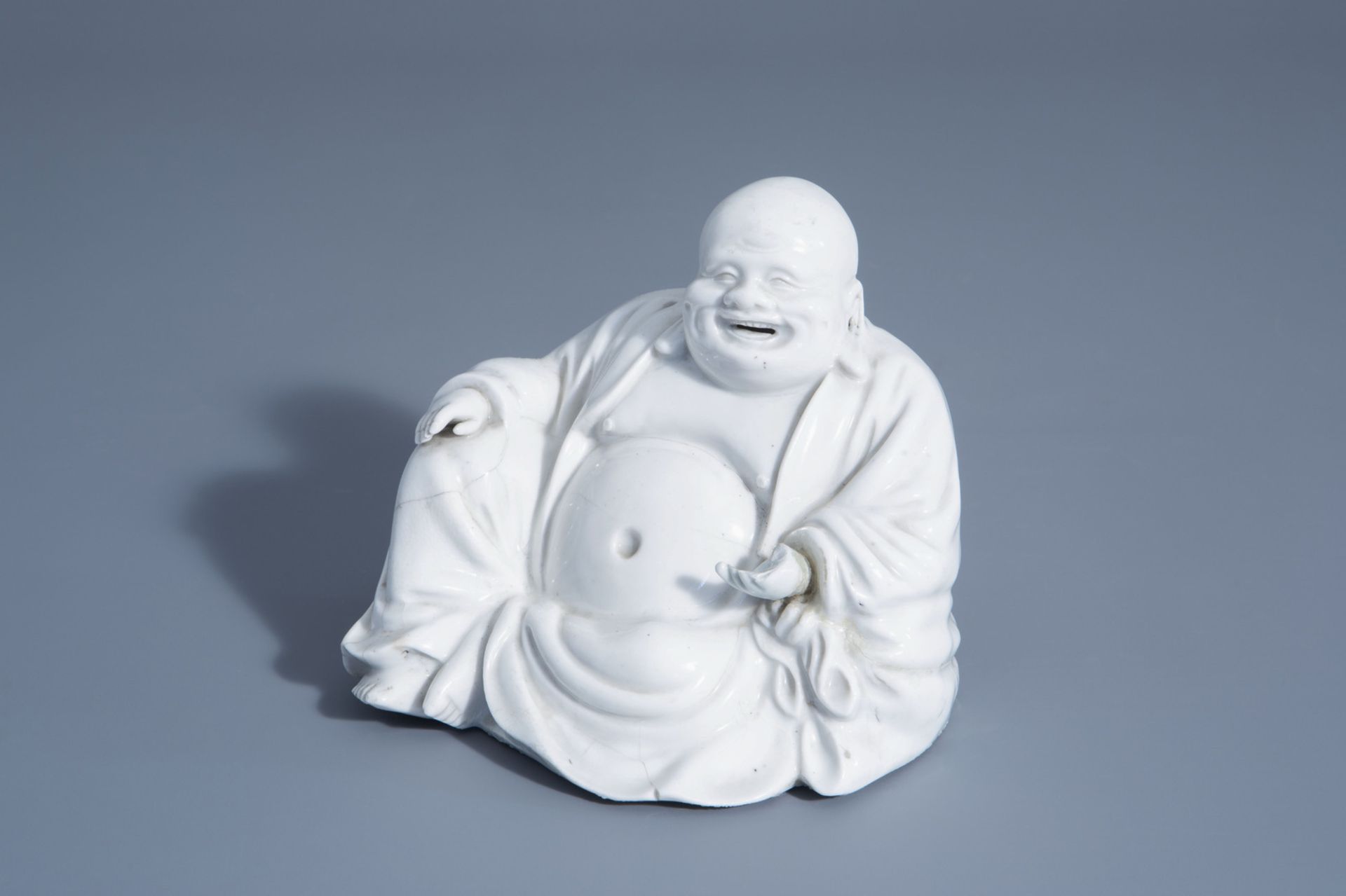 A Chinese blanc de Chine figure of Buddha, 18th/19th C.