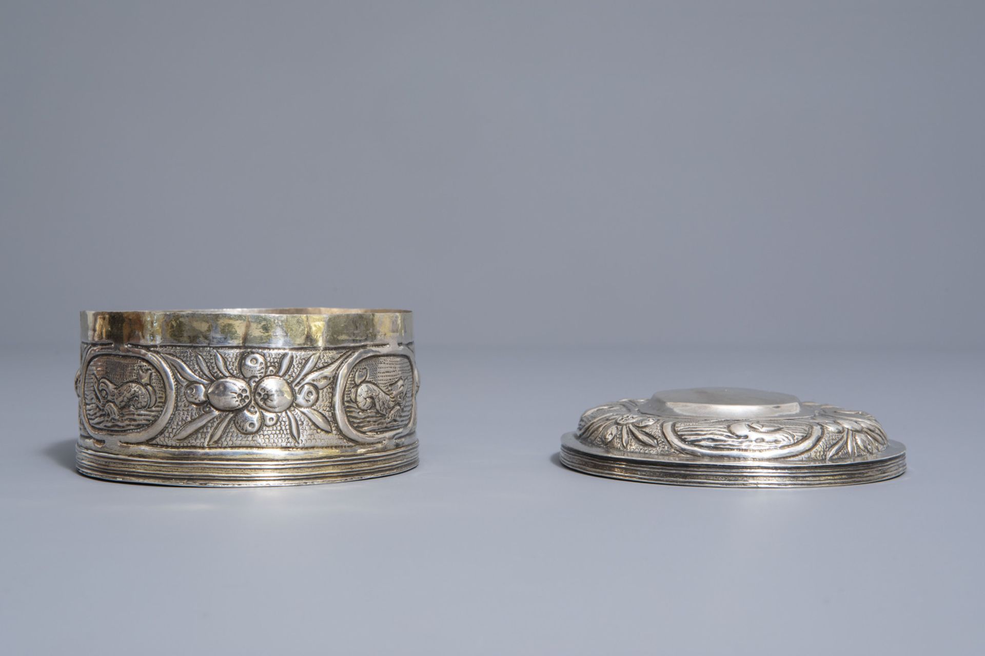 An oval shaped silver plated relief decorated tobacco box, various marks, 18th/19th C. - Image 3 of 8