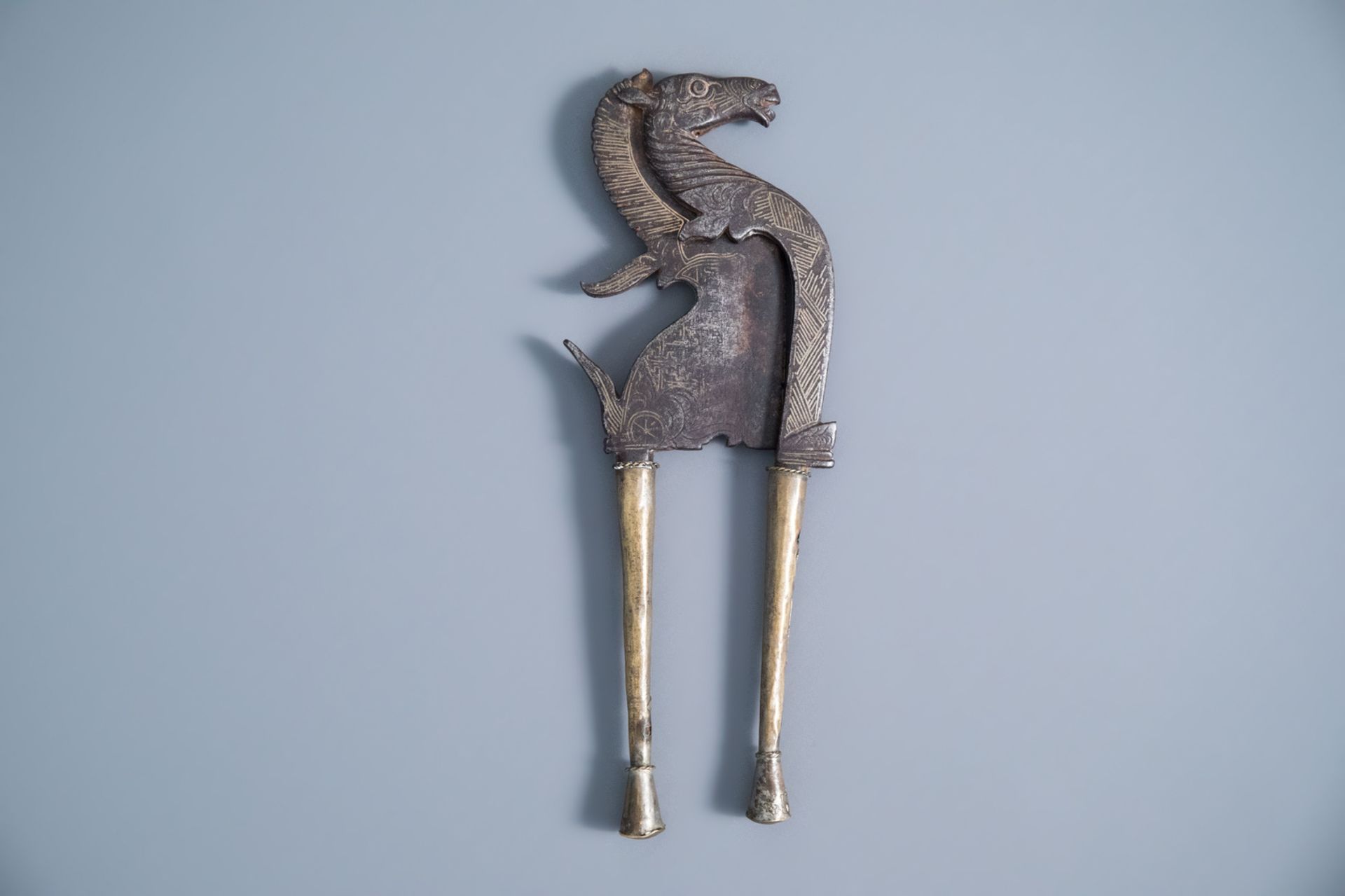 An inlaid iron and brass betel nut cutter in the shape of a horse, Indonesia, 19th C. - Image 9 of 10