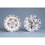 Two polychrome Dutch Delft dishes with a parrot and floral design, 18th C.