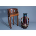 A Gothic revival wooden chair and a Flemish polychrome pottery vase with a rooster, 19th/20th C.
